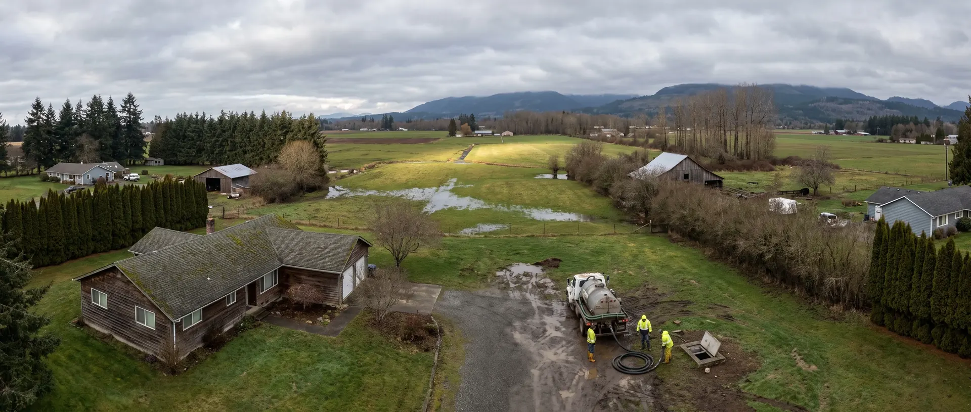 Rural Whatcom County farmland with the Cascade foothills behind